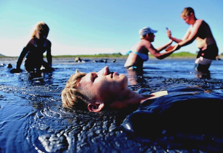 Vacationers taking mud baths at Lake Chokrak